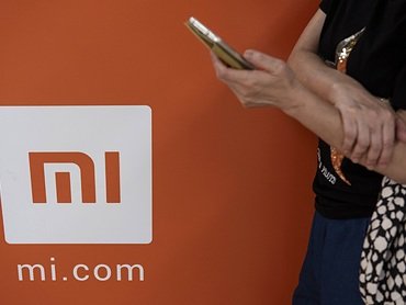 Xiaomi научит смартфоны защищаться от стороннего взгляда